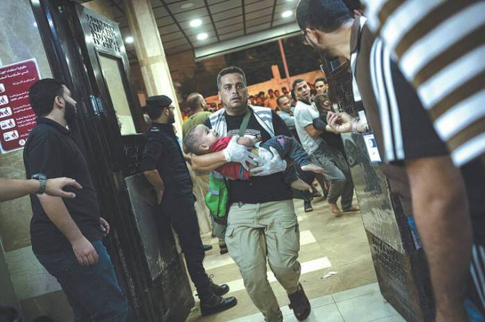 Israeli military kills 4 near aid distribution site gaza medics say